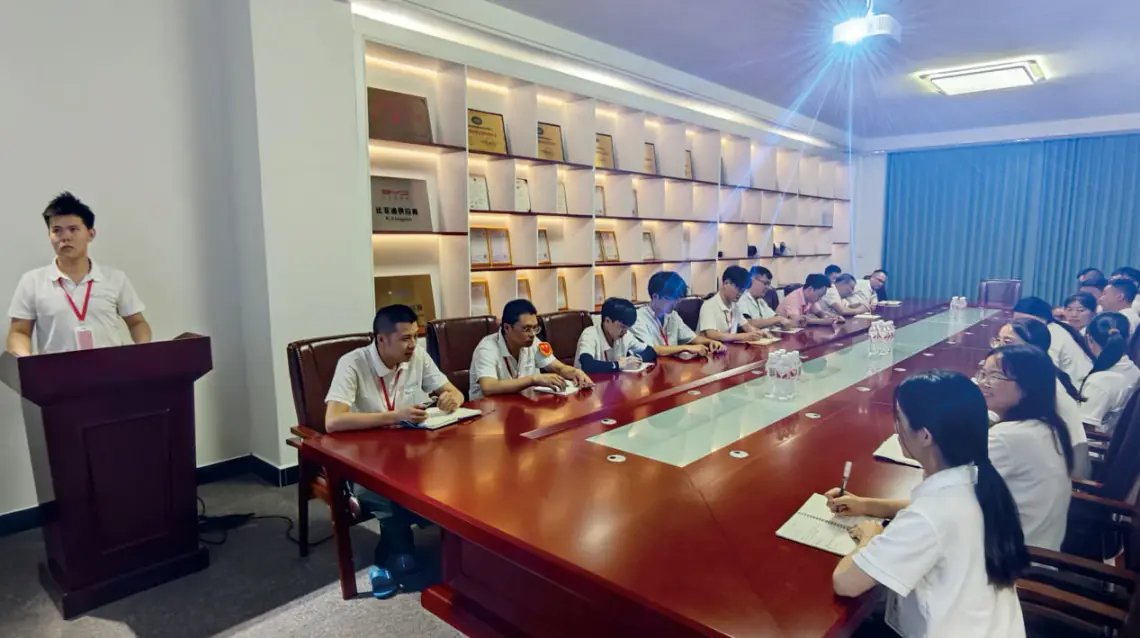 Team meeting shown in CHANGQIU company materials